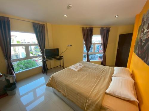 Ένα ή περισσότερα κρεβάτια σε δωμάτιο στο Aubon Hostel