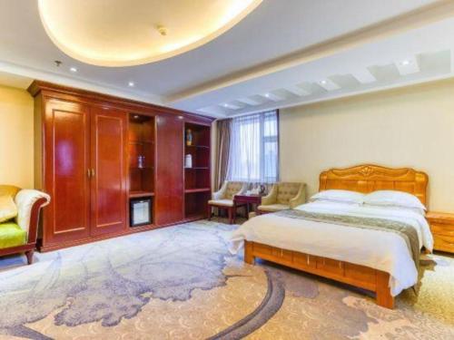 Katil atau katil-katil dalam bilik di Changchun Global Hotel