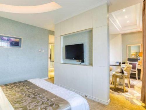 Katil atau katil-katil dalam bilik di Changchun Global Hotel
