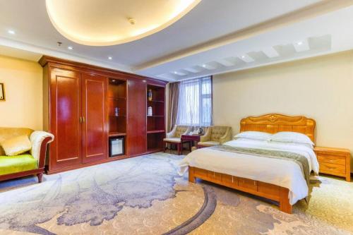 Katil atau katil-katil dalam bilik di Changchun Global Hotel