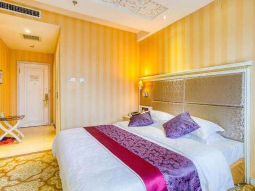 Katil atau katil-katil dalam bilik di Changchun Global Hotel