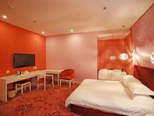 a hotel room with a bed and a desk at TO915101 STILL LOVE THEME HOTEL in Chengdu