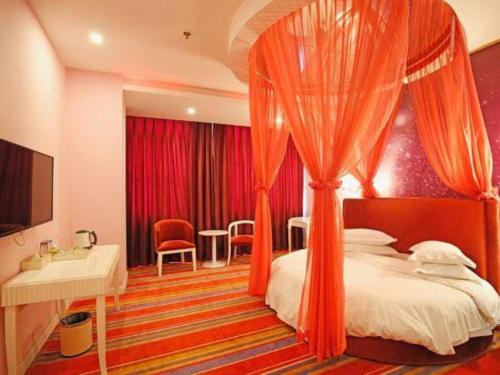 a bedroom with a bed with an orange canopy at TO915101 STILL LOVE THEME HOTEL in Chengdu