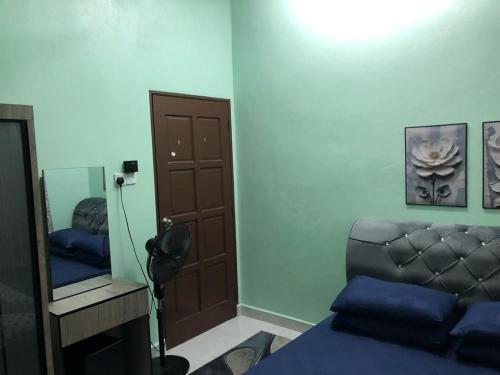 Χώρος καθιστικού στο Homestay Tanah Merah D'Domis Homestay Cek Su