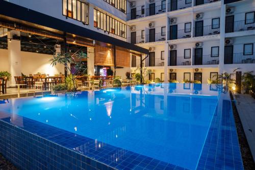 La alberca dentro o cerca de Onederz Sihanoukville - 10 mins walk from the Tourism Pier