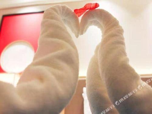 a piece of bread with a heart on it at E-Cheng Hotel Yangjiang Baili Plaza in Yangjiang
