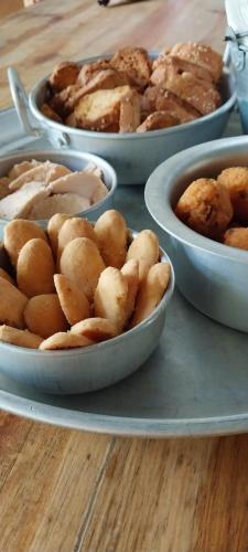 a group of bowls of food on a table at Kot Nou - Kwizine Mama Manze Lakaz in Mahébourg