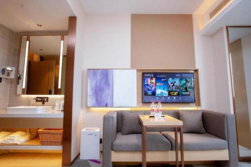 Posezení v ubytování Lavande Hotel Nanchang West Station Guoti Center Metro Station