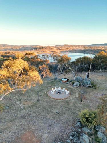 an aerial view of a fire pit in a field at Jillamatong House in Moonbah