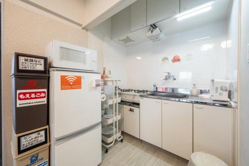 Dapur atau dapur kecil di GoodStay401