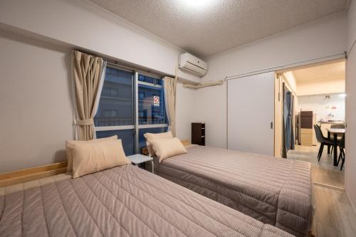 Katil atau katil-katil dalam bilik di GoodStay401