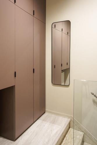a bathroom with a mirror on the wall at Mario house Assisi in Assisi