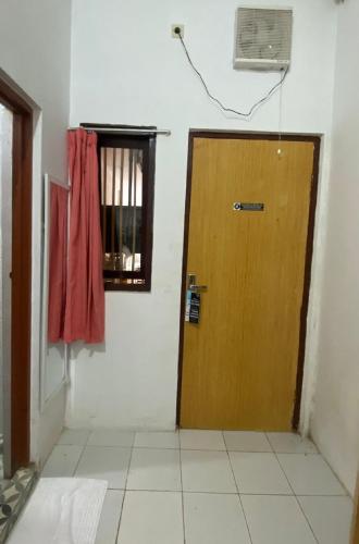 Gambar di galeri bagi DYAZA LV Grogol Guest House di Jakarta