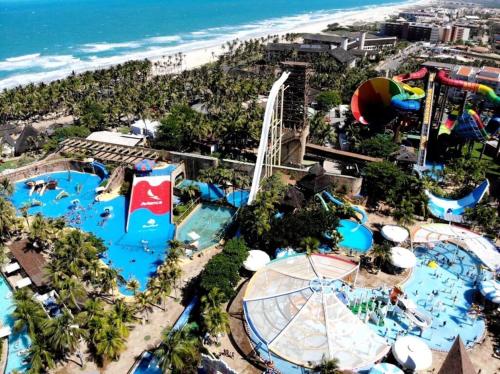 an aerial view of a water park at a resort at Hotel & Pousada Italia Beach - Porto Das Dunas in Aquiraz