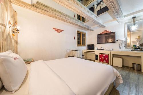 Η κουζίνα ή μικρή κουζίνα στο Goodstay Hotel I