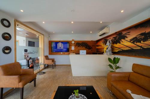 TV a/nebo společenská místnost v ubytování Perfectstayz Premium Goa Continental Baga