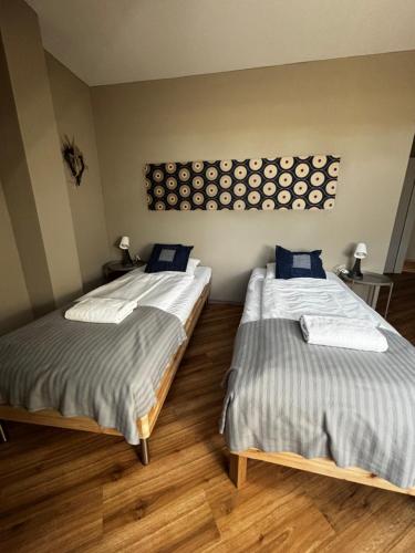 Una cama o camas en una habitación de Nest Natur Hostel
