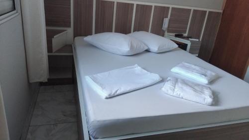 Кровать или кровати в номере Hotel Atlântica