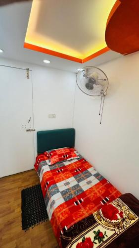 Ένα ή περισσότερα κρεβάτια σε δωμάτιο στο Hotel Rose Valley Panthapath