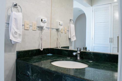 Koupelna v ubytování Hotel Aliana