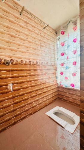 Ένα μπάνιο στο Hotel Rose Valley Panthapath