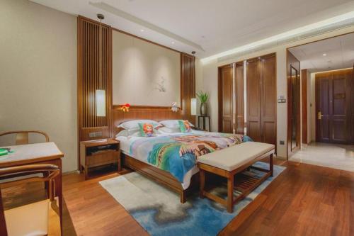 Katil atau katil-katil dalam bilik di Pingtian Bandao Hotel