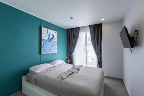 Ένα ή περισσότερα κρεβάτια σε δωμάτιο στο Pool View 1 Bed Apt T2-620