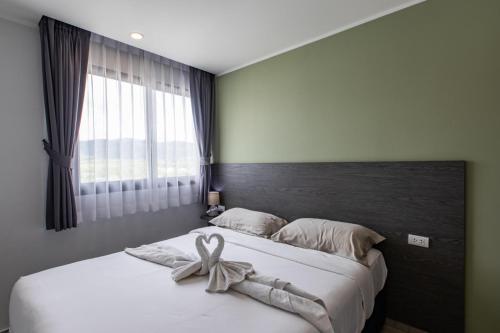 Ένα ή περισσότερα κρεβάτια σε δωμάτιο στο Mountain View Studio Apt T3-830