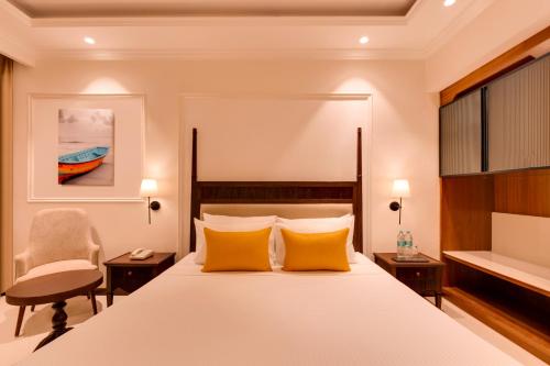 Lemon Tree Hotel, Arpora, Goaにあるベッド