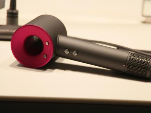 a red and black microphone sitting on top of a table at Rembrandt Cabin Shinjuku Shin-Okubo in Tokyo
