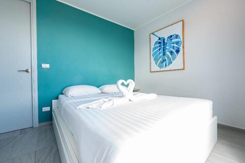 Ένα ή περισσότερα κρεβάτια σε δωμάτιο στο Sleek 2 Bed Apt T2-818