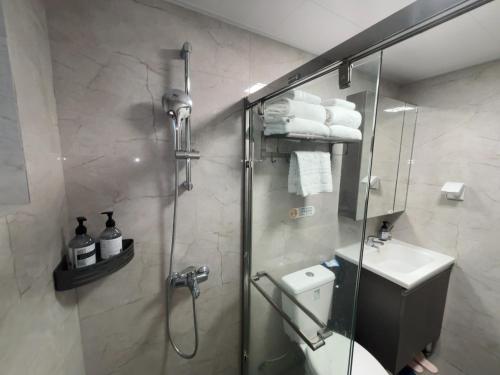 Koupelna v ubytování Xi Ke Executive Apartment - Shenzhen Futian Exhibition Center