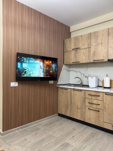 Kuchyň nebo kuchyňský kout v ubytování Fab's Apartments