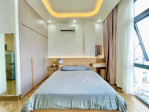 Postel nebo postele na pokoji v ubytování Dr 501 Modern studio with city view and kitchen