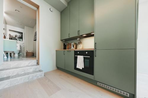 Η κουζίνα ή μικρή κουζίνα στο Spacious & Cozy Studio Apartment