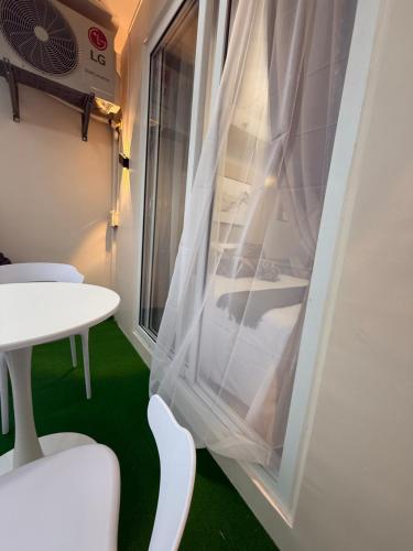 Ein Bett oder Betten in einem Zimmer der Unterkunft Condotel in Lapu lapu City