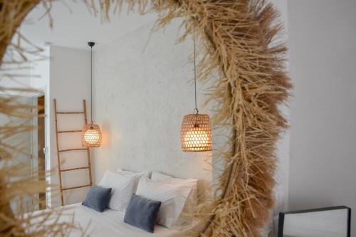 Postel nebo postele na pokoji v ubytování BOĒM Boutique Hotel Lefkada