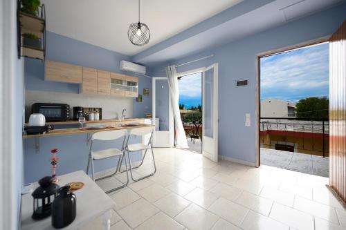 A kitchen or kitchenette at Seaside Villa Alexandra,Acharavi.