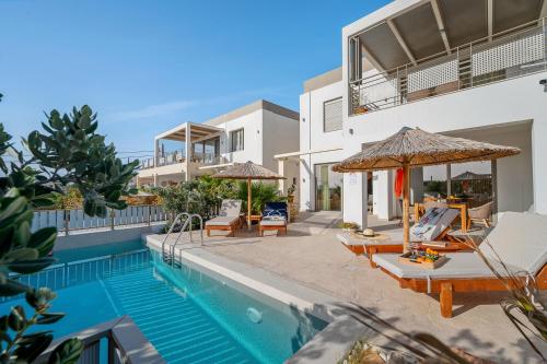 The swimming pool at or close to Ammokrinos Luxury Homes, 150m From Sea