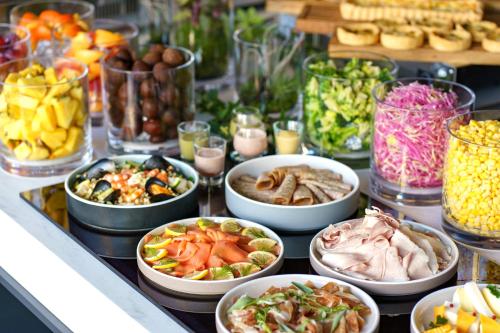 a buffet of different types of food on a table at Premier hotel -CABIN PRESIDENT- Tokyo in Tokyo