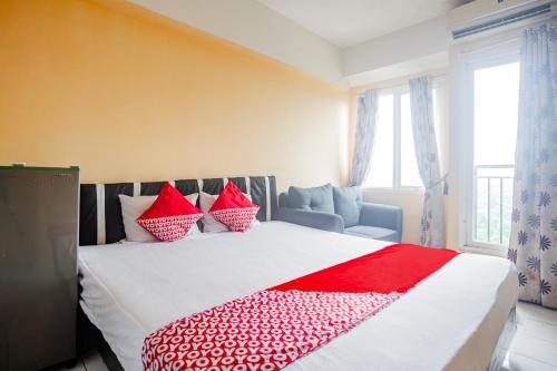Gallery image of OYO 94080 Apartemen Podomoro Golf View Palito Rooms in Tjikuda Tiga