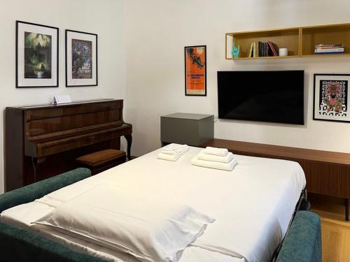 Postel nebo postele na pokoji v ubytování PrimoPiano Centro