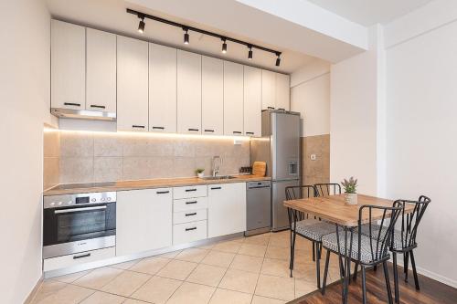 Kuchyň nebo kuchyňský kout v ubytování Flat N 5