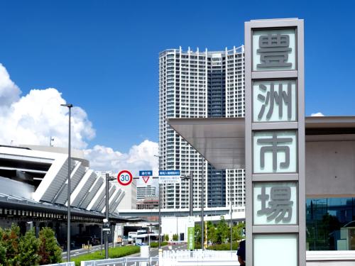 a building with a sign in front of a city at Premier hotel -CABIN PRESIDENT- Tokyo in Tokyo