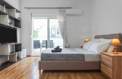 Ένα ή περισσότερα κρεβάτια σε δωμάτιο στο Casa Aurora Rhodes