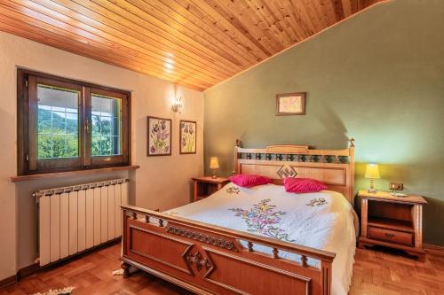 Ένα ή περισσότερα κρεβάτια σε δωμάτιο στο Villa Lolli