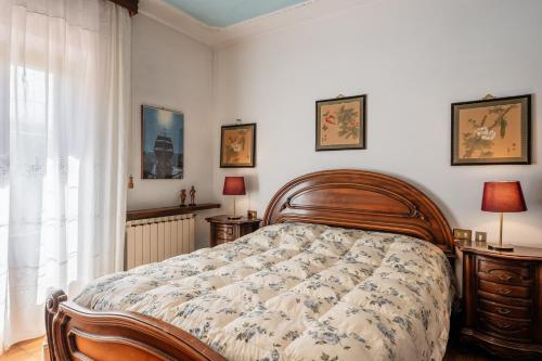Ένα ή περισσότερα κρεβάτια σε δωμάτιο στο Villa Lolli