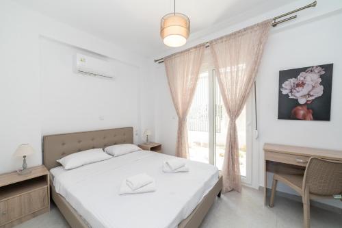 Katil atau katil-katil dalam bilik di Iro Residential Complex