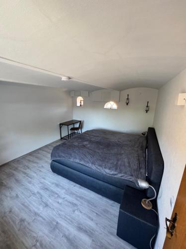 Una cama o camas en una habitación de Niederrhein Kaue