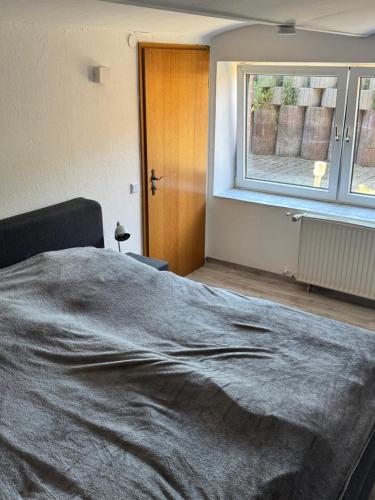 Una cama o camas en una habitación de Niederrhein Kaue